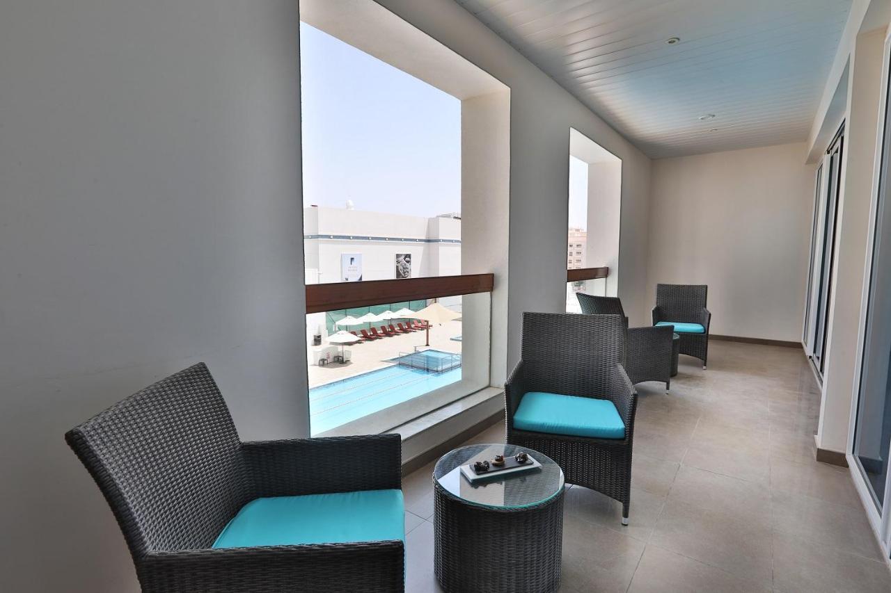 Four Points By Sheraton Al Ain Exterior photo A balcony at the hotel